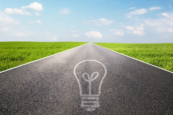 asphalt-road-with-light-bulb-painted